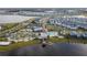 Aerial view of the community amenity, water park, lake and residential area at 3120 Paradox Cir # 204, Kissimmee, FL 34746