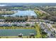 Aerial view of neighborhood with lake at 3204 Wauseon Dr, St Cloud, FL 34772