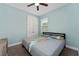 Neutral bedroom with carpet, a double door closet, and window, offering a serene and relaxing atmosphere at 3204 Wauseon Dr, St Cloud, FL 34772