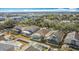 Aerial view of several homes in the community, featuring a pool and backyard at 331 Henley Cir, Davenport, FL 33896