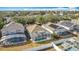 This aerial view showcases the home's screened-in pool and backyard in a lovely neighborhood at 331 Henley Cir, Davenport, FL 33896