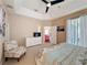 Carpeted bedroom with trey ceiling, fan, and furniture at 331 Henley Cir, Davenport, FL 33896