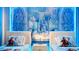 Charming themed bedroom featuring 'Frozen' decor with twin beds and a castle backdrop, perfect for a fun, imaginative space at 3348 Lilac Way, Davenport, FL 33897