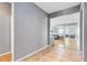 Spacious living room with tile flooring leading to a bright open-concept living area at 3431 Perching Rd, St Cloud, FL 34772