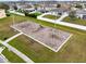 Community playground features swings, a slide, and benches surrounded by green space at 3431 Perching Rd, St Cloud, FL 34772