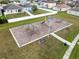 Community playground features swings, a slide, and benches surrounded by green space at 3431 Perching Rd, St Cloud, FL 34772