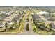 Aerial view of a well-planned community with manicured streets and neighborhood lakes at 417 Noble Ave, Davenport, FL 33837