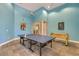 Fun game room featuring a ping pong table and foosball table with bright lighting and décor at 4506 Alberto Cir, Kissimmee, FL 34746