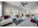 Bright and airy living room featuring tile floors, contemporary furniture, and lots of natural light at 4506 Alberto Cir, Kissimmee, FL 34746