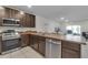 Well-equipped kitchen with stainless steel appliances and spacious countertops at 4846 Coral Castle Dr, Kissimmee, FL 34746