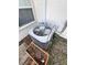 Exterior shot of the air conditioner in the yard, ensuring climate control at 710 E Arizona Ave # A, Deland, FL 32724