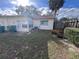 Partial view of the backyard with grassy area and a patio, blending indoor and outdoor living at 710 E Arizona Ave # A, Deland, FL 32724