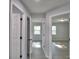 Hallway view looking into bedrooms at 713 Greenleaf Ln, Lake Wales, FL 33853