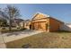 Charming one-story home featuring a well-manicured lawn and a two-car garage at 714 Franklin Ct, Haines City, FL 33844