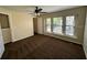 Spacious bedroom featuring neutral carpet, a ceiling fan, and natural light at 727 Siena Palm Dr, Celebration, FL 34747