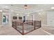 Open hallway with ornate railing overlooking the entryway and elegant decor at 7471 Gathering Loop, Reunion, FL 34747