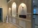 Entryway showcasing stylish wall niches with lighting and decorative accents at 856 Jarnac Dr, Kissimmee, FL 34759