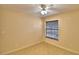 Bedroom featuring a window and ceiling fan at 105 Shaddock Dr, Auburndale, FL 33823