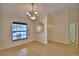 Spacious dining room with tile floors and natural lighting at 105 Shaddock Dr, Auburndale, FL 33823