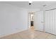 Bedroom featuring neutral tile flooring, a closet and access to the bathroom at 11 Silver Falls Cir, Kissimmee, FL 34743