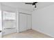 Bedroom with neutral tile flooring, a closet and natural lighting at 11 Silver Falls Cir, Kissimmee, FL 34743