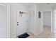 Bright entryway featuring tile flooring and ample closet space at 11 Silver Falls Cir, Kissimmee, FL 34743