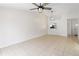 Bright and open living room featuring tile floors, ceiling fan and natural lighting at 11 Silver Falls Cir, Kissimmee, FL 34743