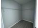 Walk-in closet featuring wire shelving and space for optimal storage solutions at 113 Dogwood Drive Circle, Ocala, FL 34472