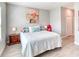 Cozy bedroom with soft lighting, comfortable bed, neutral walls, and modern décor at 125 Inconnu Ct, Poinciana, FL 34759