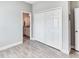 Bedroom leading to the bathroom with large double door closets at 125 Inconnu Ct, Poinciana, FL 34759