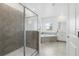 This bathroom features a walk-in shower, soaker tub, and dual sink vanity at 139 Aces High Ln, Davenport, FL 33896