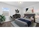 Cozy bedroom with modern decor, soft carpet, and a stylish rhino-shaped bookshelf at 139 Aces High Ln, Davenport, FL 33896