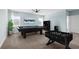 Spacious bonus room featuring a pool table and foosball table, perfect for entertaining at 139 Aces High Ln, Davenport, FL 33896