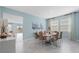 Elegant dining room with contemporary table set and bright, airy atmosphere at 139 Aces High Ln, Davenport, FL 33896