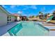 Relax in this sparkling in-ground pool and enjoy the outdoor amenities like a slide and trampoline at 1464 Howland Blvd, Deltona, FL 32738