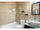 Well-appointed bathroom with a combined tub and shower, stylish vanity, and modern fixtures at 226 Bailey Cir, Davenport, FL 33897