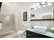 Clean bathroom with a shower-tub combo, modern fixtures, and a white vanity at 226 Bailey Cir, Davenport, FL 33897