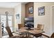 Living room featuring a dining area, glass table, tile floors, and backyard access at 226 Bailey Cir, Davenport, FL 33897