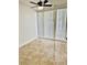 Sunlit bedroom featuring tile flooring and large windows at 2464 Harbour Way, Winter Park, FL 32792