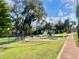 Community playground and picnic area with well maintained lawn at 2464 Harbour Way, Winter Park, FL 32792