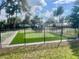 Fenced community putting green and playground area at 2464 Harbour Way, Winter Park, FL 32792