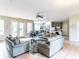 Open-concept community room with comfortable seating and dining area for residents at 4823 Coral Castle Dr, Kissimmee, FL 34746