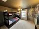 Whimsical bedroom with custom Harry Potter themed decor and bunk beds at 4875 Clock Tower Dr, Kissimmee, FL 34746