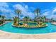 Community lazy river with a small island in the center and plenty of room to float at 4875 Clock Tower Dr, Kissimmee, FL 34746