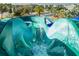 View from atop a thrilling waterslide on a bright day in the community at 4875 Clock Tower Dr, Kissimmee, FL 34746