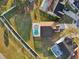 Aerial view of home with large backyard and screened in pool at 4919 Dunmore Ln, Kissimmee, FL 34746