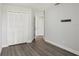 Bedroom featuring neutral walls, closet, and door at 4919 Dunmore Ln, Kissimmee, FL 34746