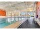 Well-maintained indoor pool space with marked depths, providing a clear and inviting swimming experience at 507 Pamplona Pl, Davenport, FL 33837