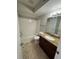 Bathroom with a shower-tub combination and a vanity with a granite countertop at 5152 Conroy Rd # 1333, Orlando, FL 32811