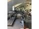 Well-equipped fitness center with treadmills, bikes, and other exercise machines for residents' health and wellness at 5152 Conroy Rd # 1333, Orlando, FL 32811